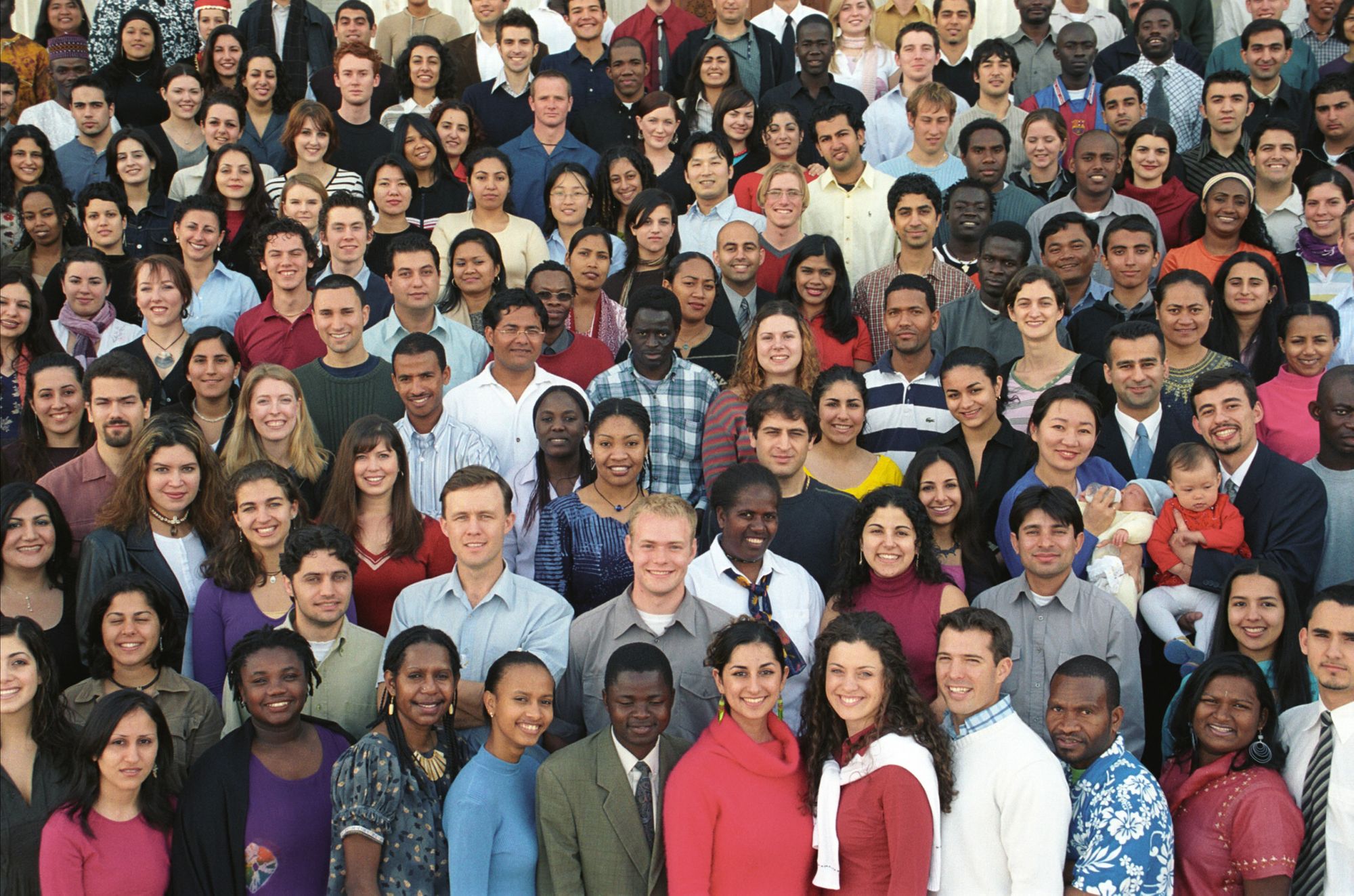 A diverse group of Baha'is gathered together